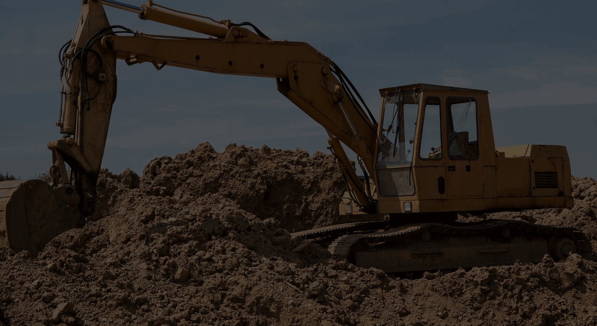 Image of a Construction Vehicle Moving Dirt